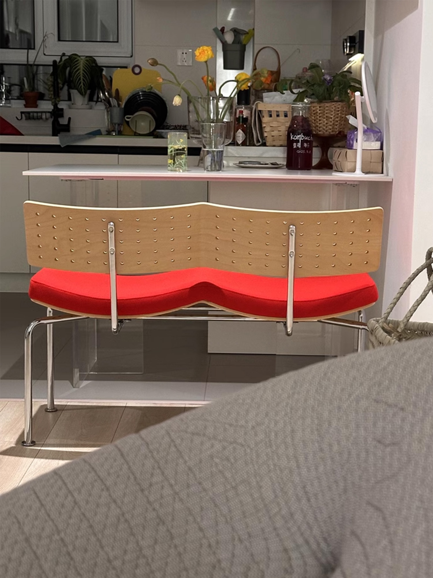 Flying bench 20 Flying Bench with red upholstered seat at a kitchen counter