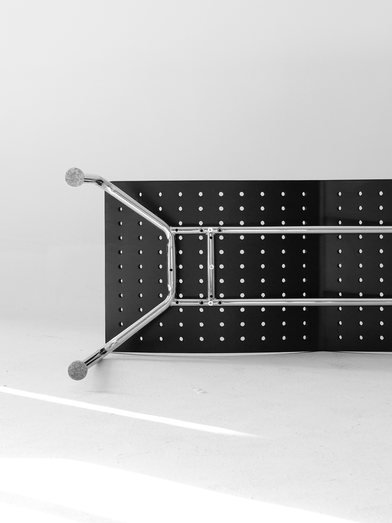 Flying bench 16 Rear view of Flying Bench with black perforated backrest