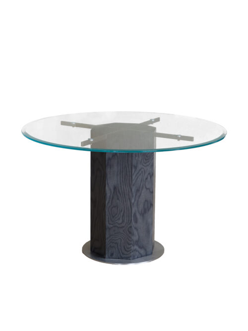 Ptolemy glass table with dark veneer pedestal studio view