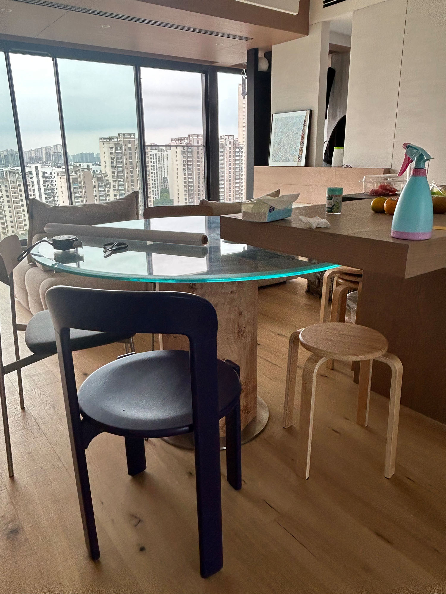 Ptolemy round table 21 Ptolemy glass dining table by large window
