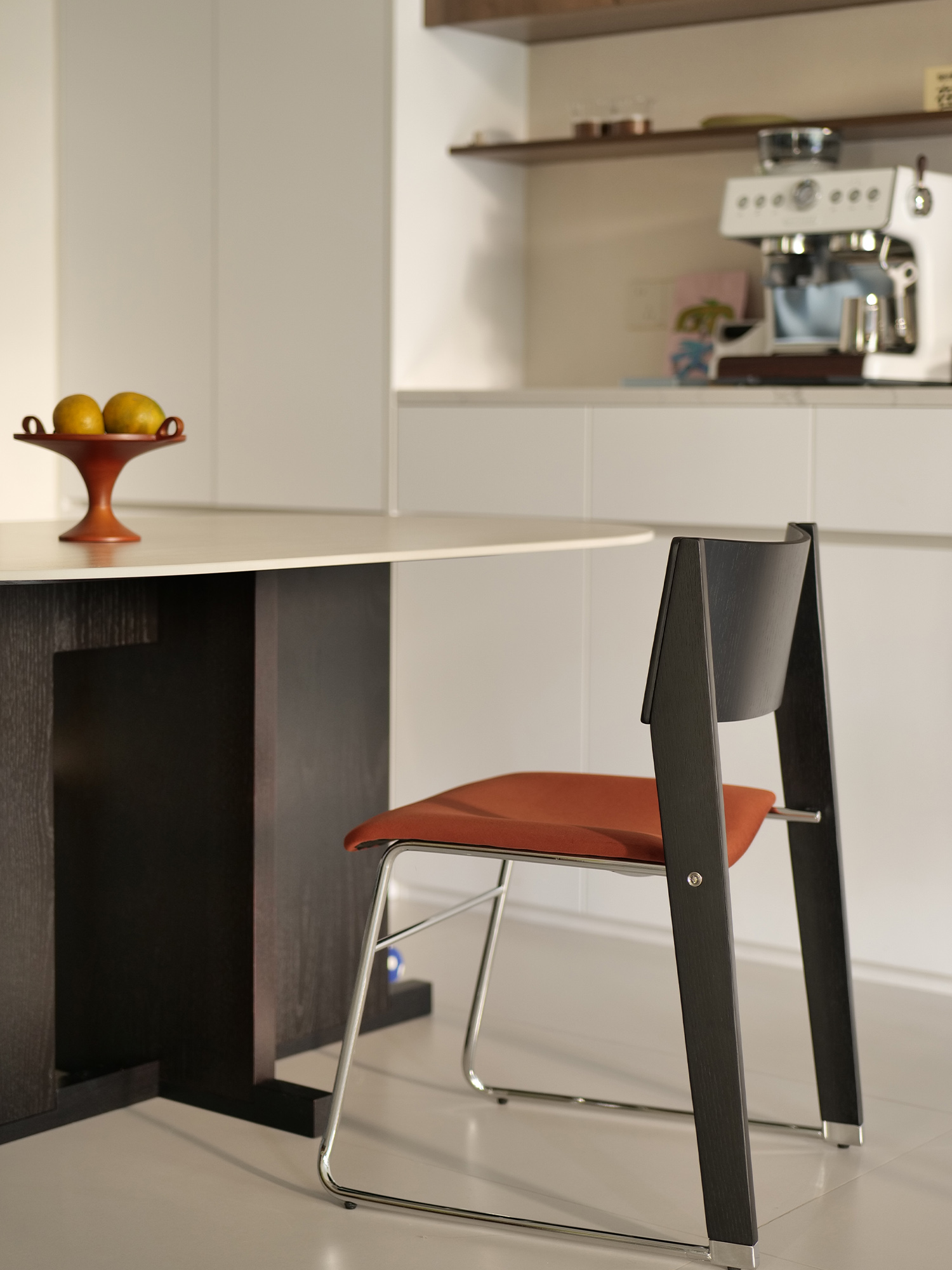 walk slowly chair 20 Walk Slowly Chair beside kitchen counter with rust velvet seat