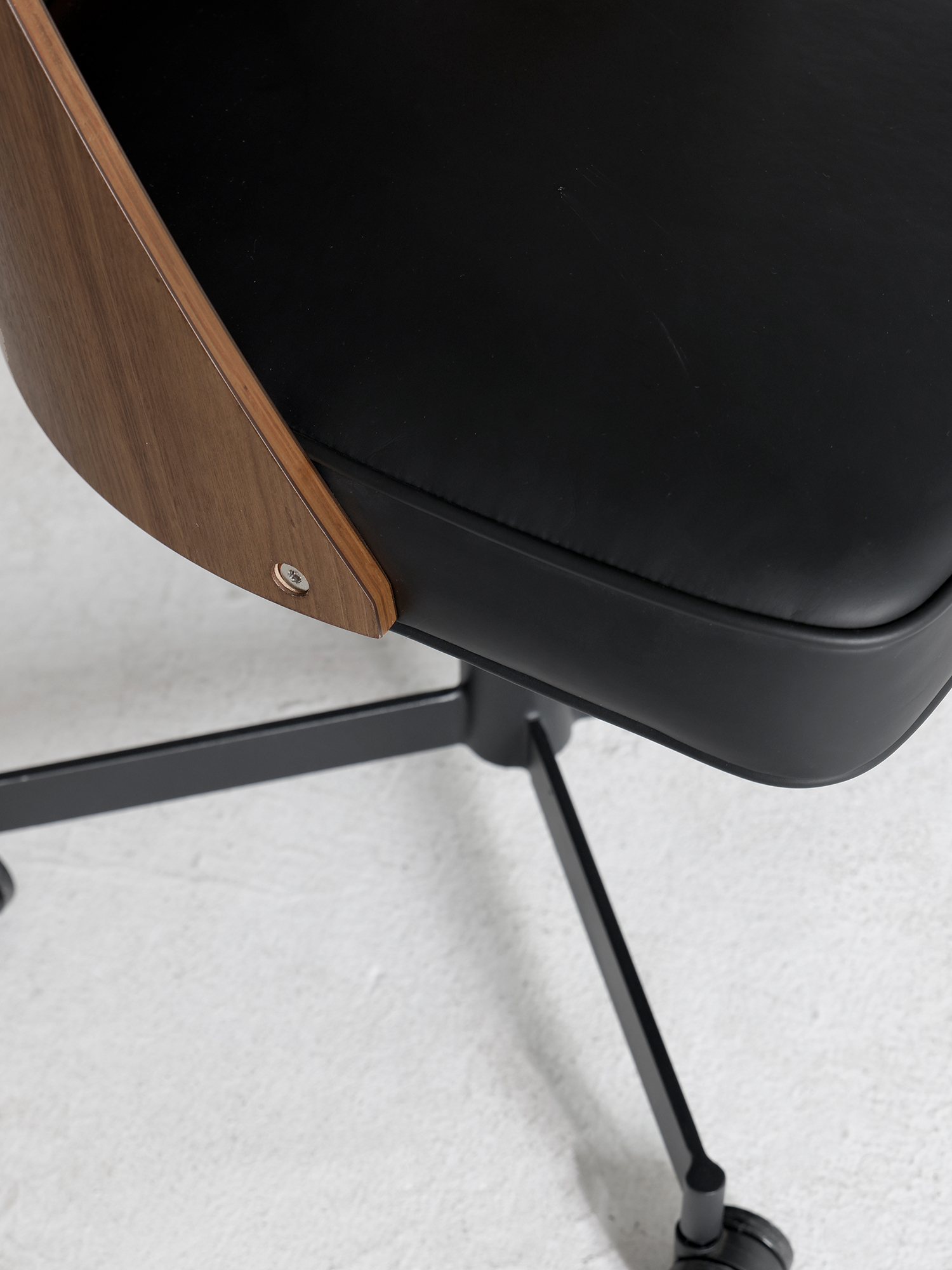 Pop chair 17 Pop Chair leather seat metal base and caster detail