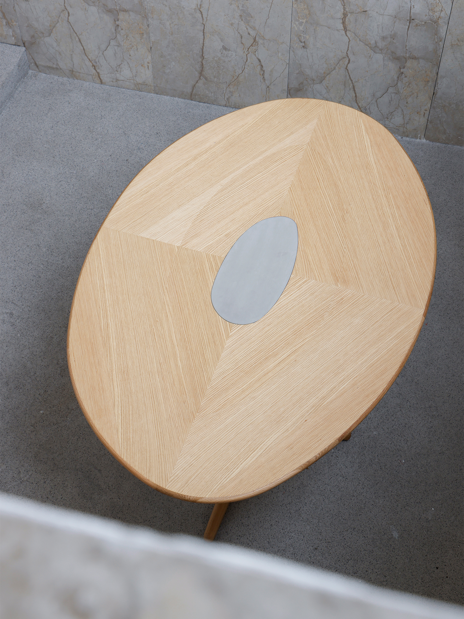 Pebble dining table 18 Pebble oak veneer tabletop viewed from above
