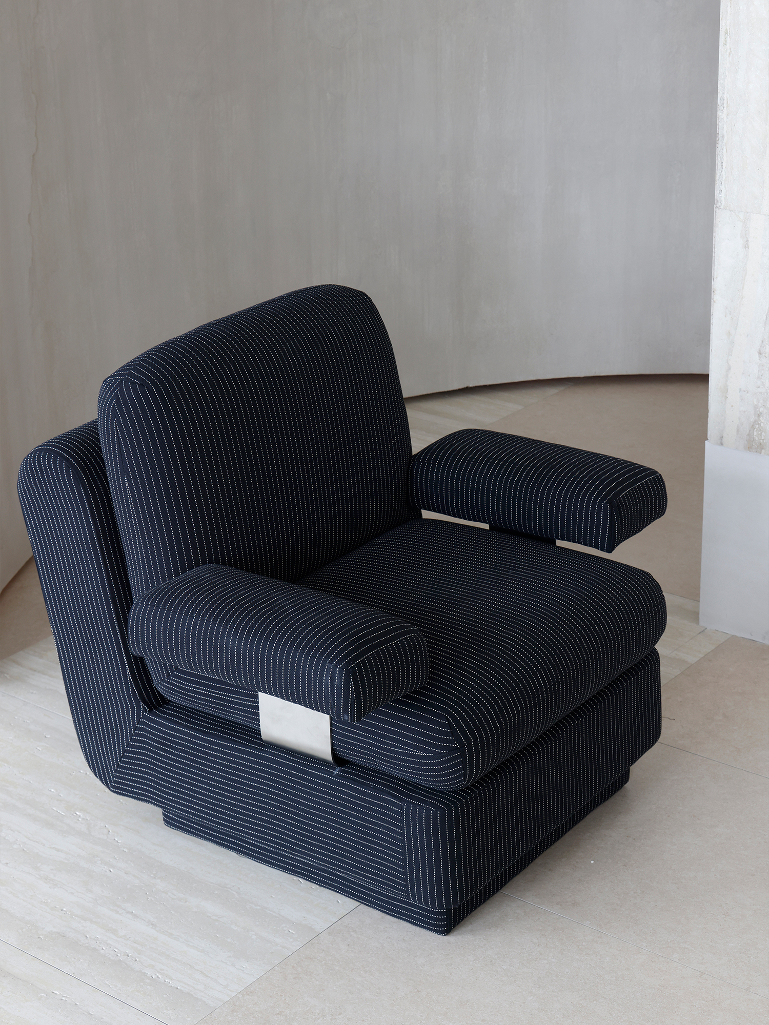 Rest sofa 21 Deeprest dark striped upholstered sofa with stainless-steel armrest