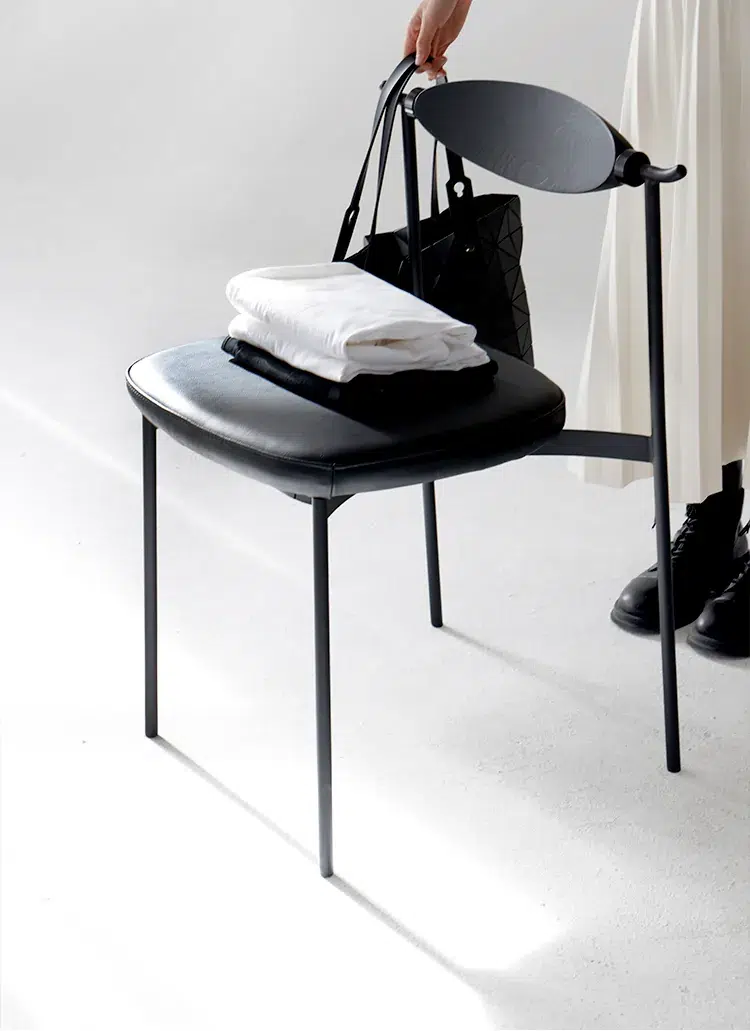 Alison Chair 2.0 Design Story 18 Black Alison Chair 2.0 used beside a curtain