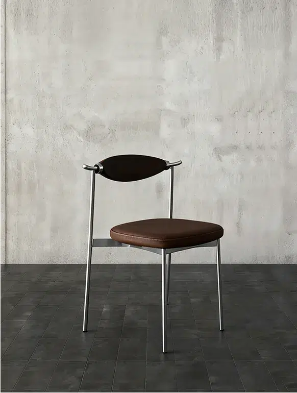 Alison Chair 2.0 Design Story 17 Brown Alison Chair 2.0 in a concrete interior