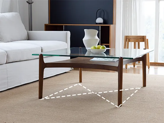 Coffee Table Size for Living Rooms 18 Low rectangular glass table paired with a timber chair