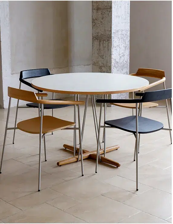 Restaurant Table Sizes and Seating Capacity Guide 15 Round dining table arranged with mixed dining chairs