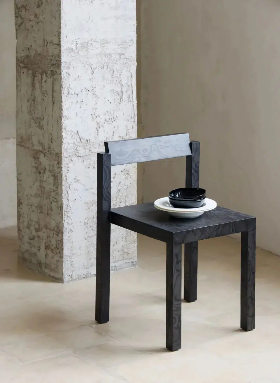 Solid Wood vs Wood Veneer for Furniture Projects 18 Dark veneer Klein Chair in a concrete interior