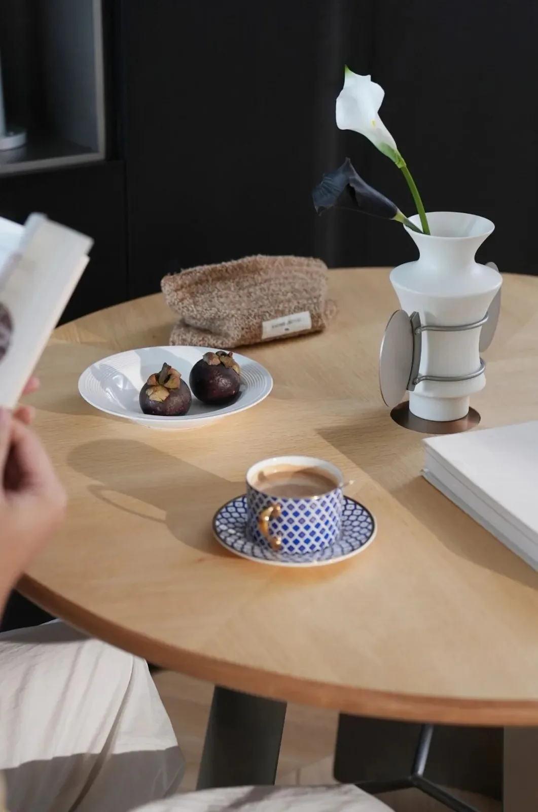 Solid Wood vs Wood Veneer for Furniture Projects 22 Natural wood veneer dining tabletop with books and tableware